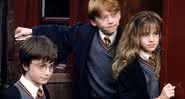Daniel Radcliffe, Emma Watson e Rupert Grint em "Harry Potter e a Pedra Filosofal" - (Divulgação/Warner Bros.)