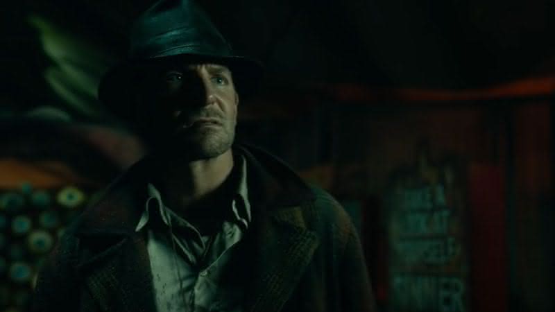 Bradley Cooper interpreta trapaceiro no longa - (Divulgação/20th Century Studios)